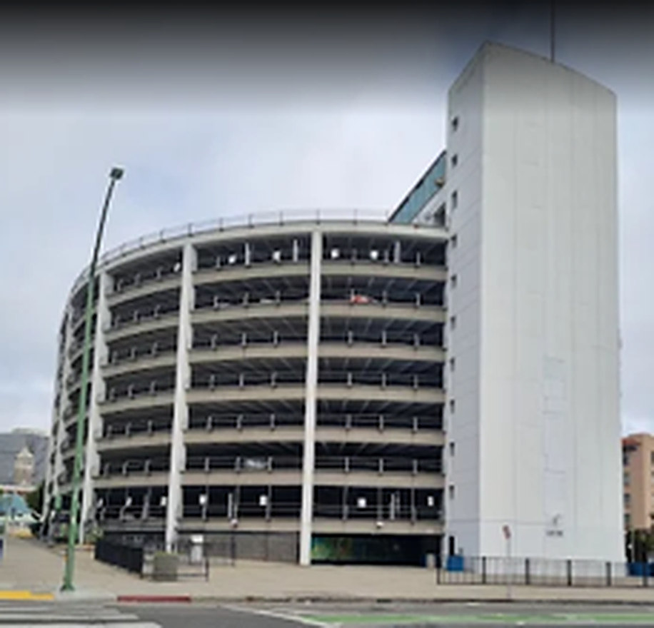 The curved concrete decks of the Alcopark parking garage in Oakland