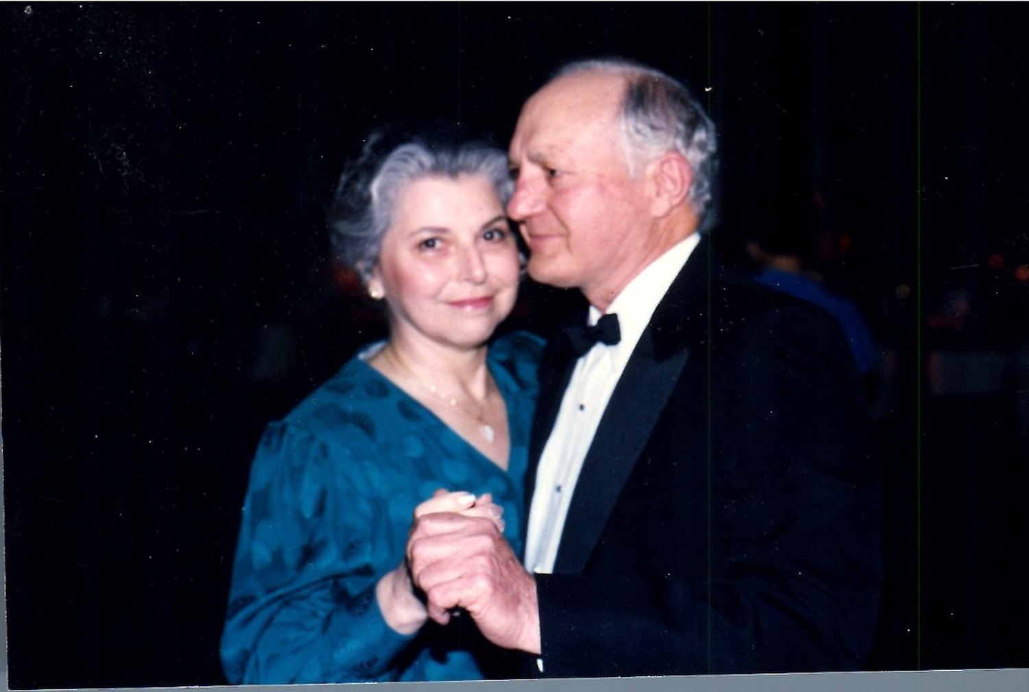 Benny and Bette Enea dancing in evening dress, 1987
