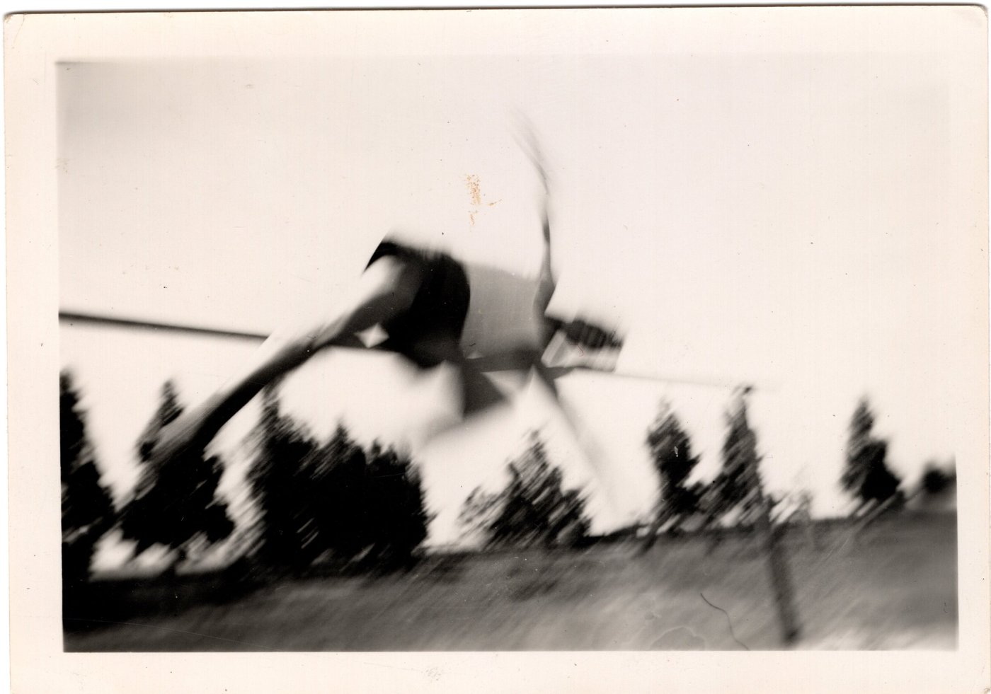 A blurred action photograph of Benny Enea crossing the bar