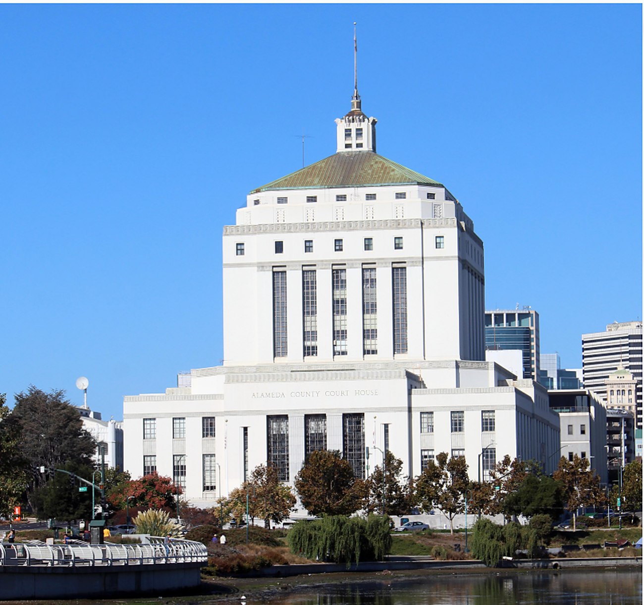 The Alameda County Courthouse in Oakland, a pale stone building with a stepped tower