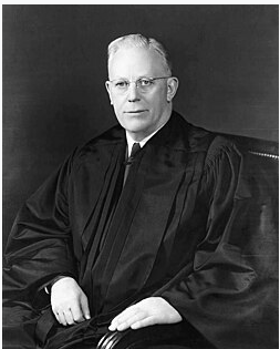 Portrait of Earl Warren seated in judicial robes