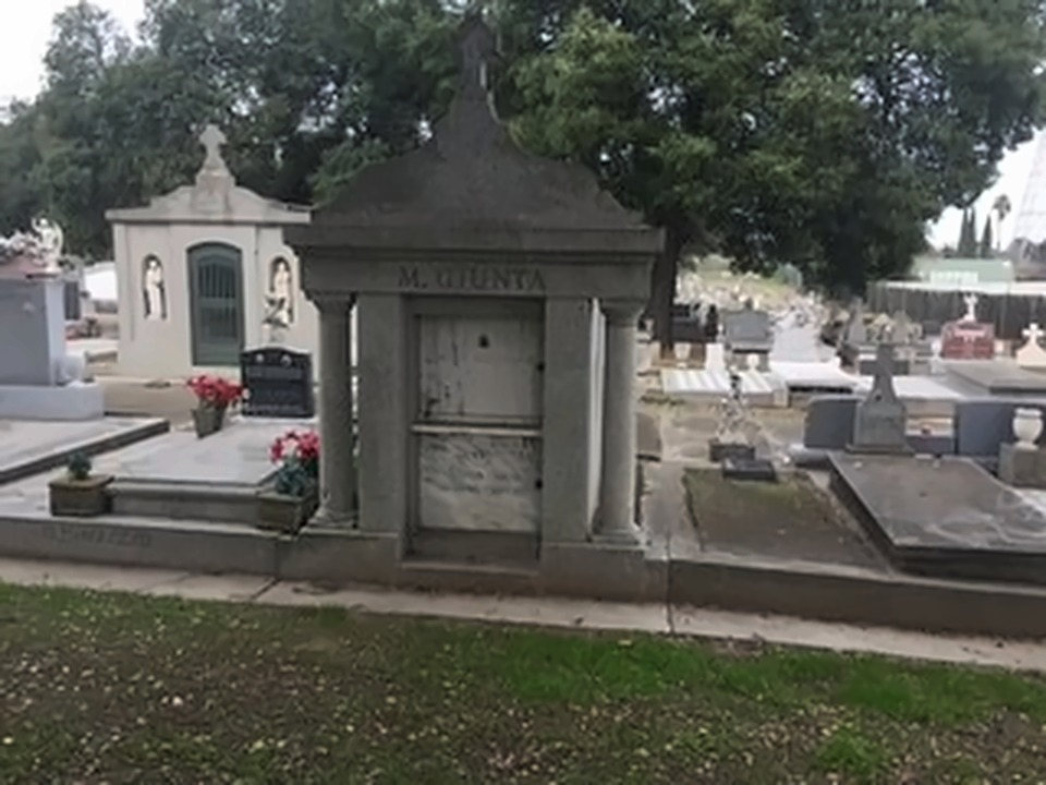 Stone mausoleum with GIUNTA cut into the lintel